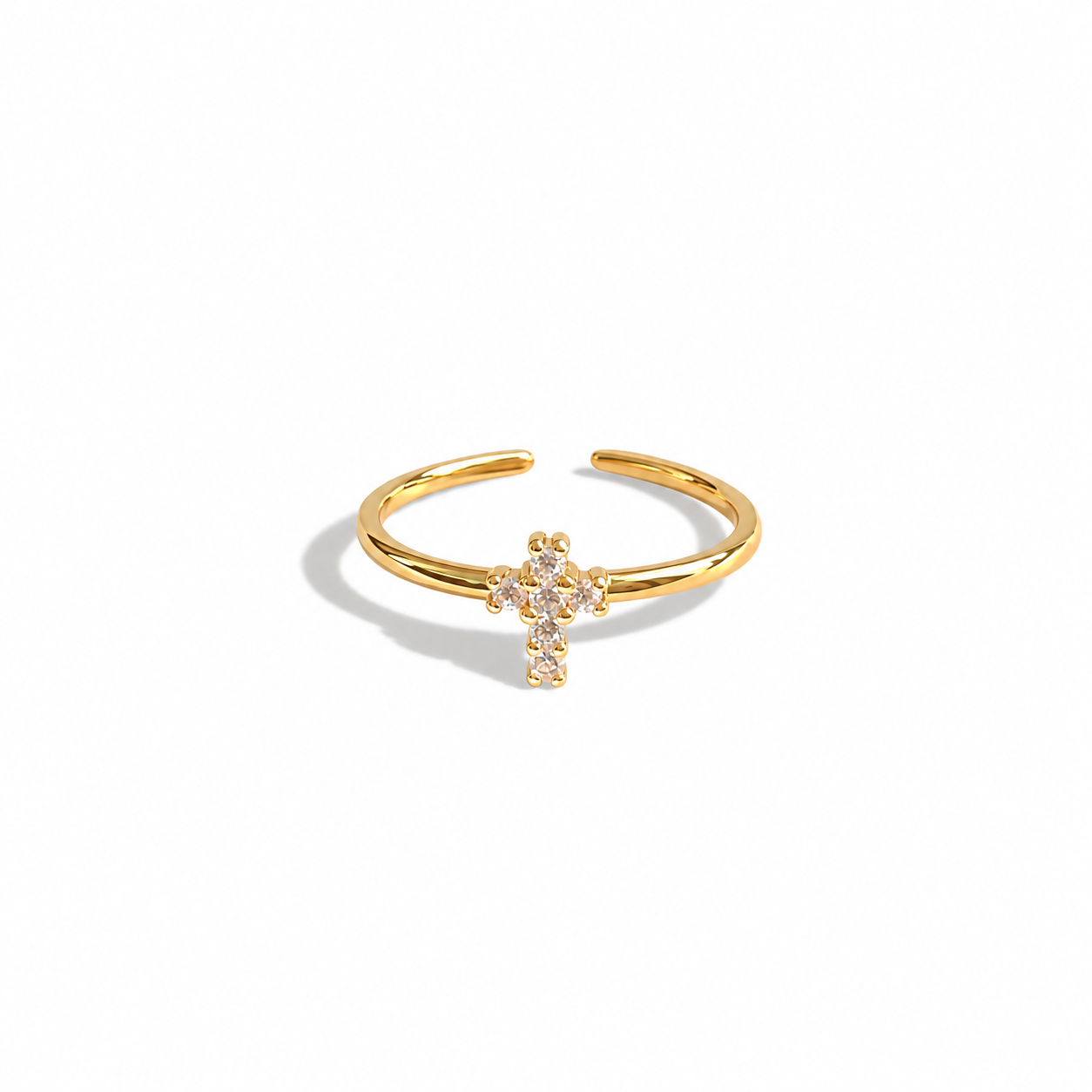 Mini Grace Cross Ring in gold with six clear cubic zirconia stones, front view