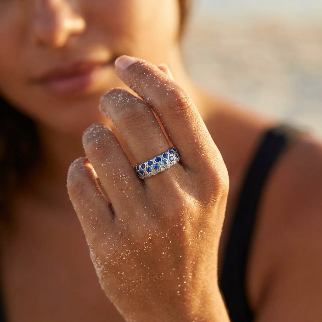 Azure Sea Ring, 925 sterling silver eternity band with sapphire blue, ocean blue, and clear cubic zirconia in wave-pattern settings